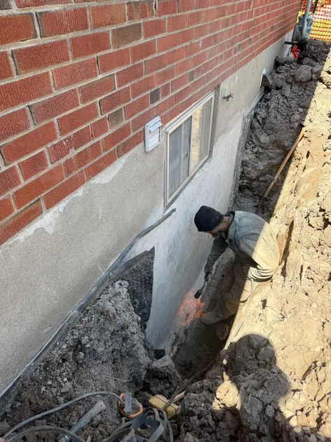 Completed basement waterproofing work